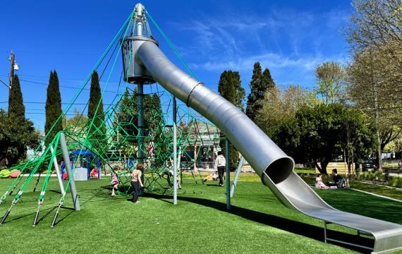 kids playing on the climbing structure at South Park's new playground in Seattle