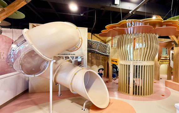 indoor play place with slide and climbing structures at Sunrise Play Cafe in Tacoma