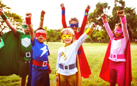 Kids dressed up as superheroes