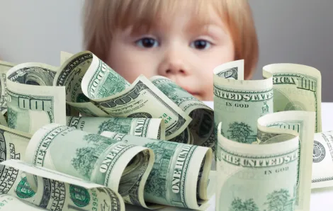 Toddler with cash