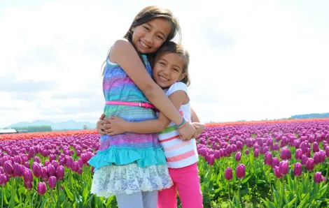 girls in tulip field credit Jennifer Choi