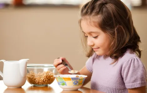 Girl eating cereal 