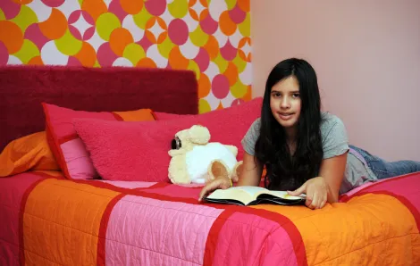 Teenage girl reading a book