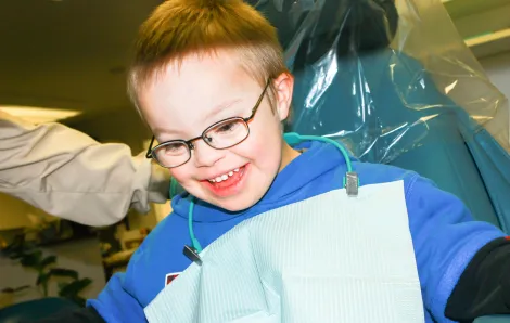 Cute boy who has special needs has a dental appointment