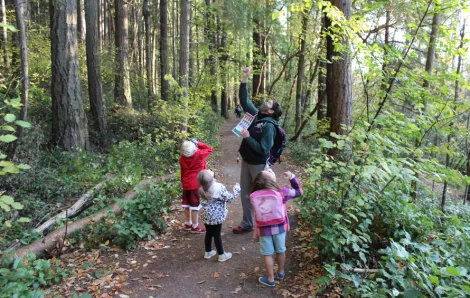 kids on the trail with a nature guide