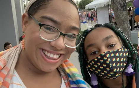 Leigha Grimes and Amelia at a pride parade