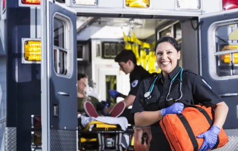 EMT helping and smiling