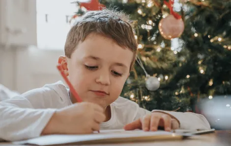 Kid-writing-letter-to-Santa