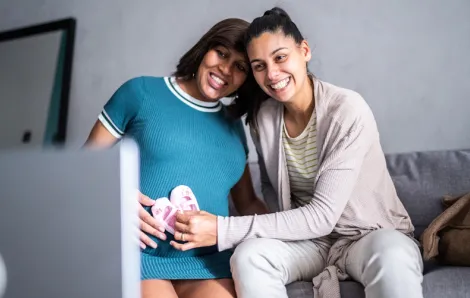 LGBTQ couple expecting a baby on a Zoom call