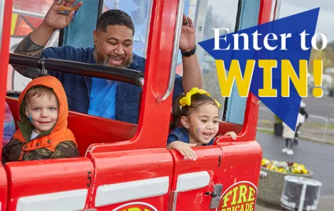 "Enter to Win" text over family on a ride at the fair
