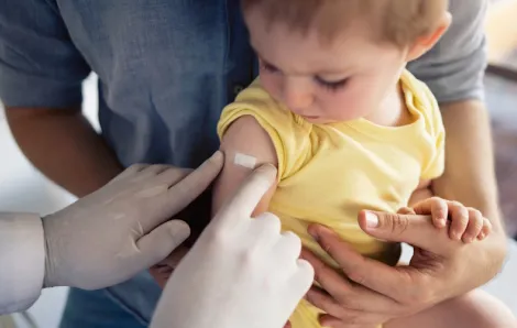 Child getting a vaccination shot