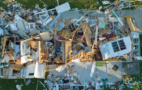 Shot from above of a house smashed by a storm