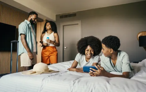 kids in a hotel room having fun