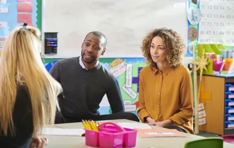 parents at a parent teacher conference