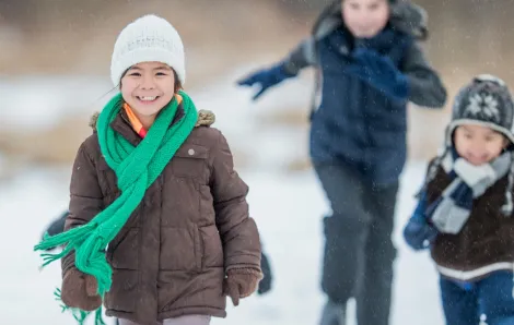 kids hiking outside in winter