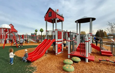 kids playing at the Van Lierop Park playground, one of the newest Puget Sound playgrounds to open in 2025