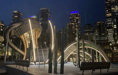 the Pier 58 Playground in Seattle lit at night
