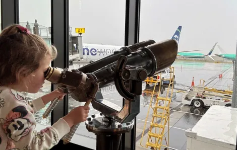 young girl watching planes at Paine Field