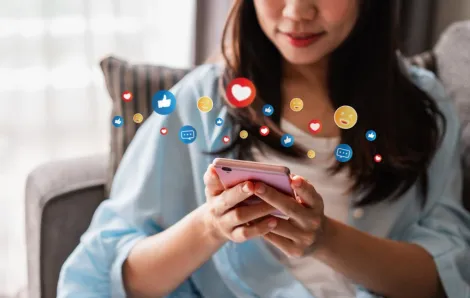 young girl using social media on smartphone