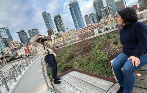 Taking a picture of joy shigaki at Seattle Waterfront