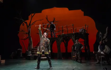Robin Hood catches an arrow onstage during Seattle Children's Theatre's newest production