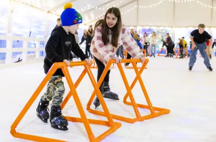 kids ice skating together at Tulalip Lights and Ice