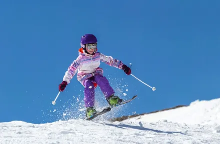 young girl skiing near Seattle over winter break, a fun family activity