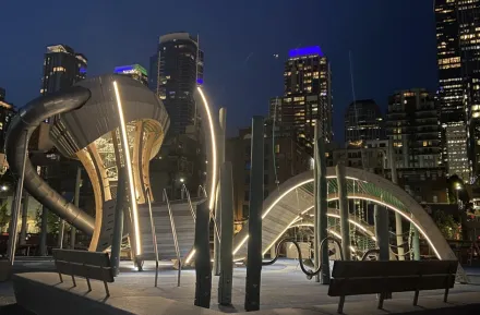 the Pier 58 Playground in Seattle lit at night