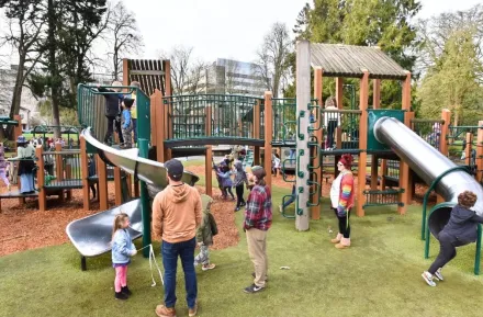 wright park playground reopening celebration with families playing
