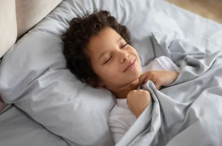 boy sleeping in bedroom