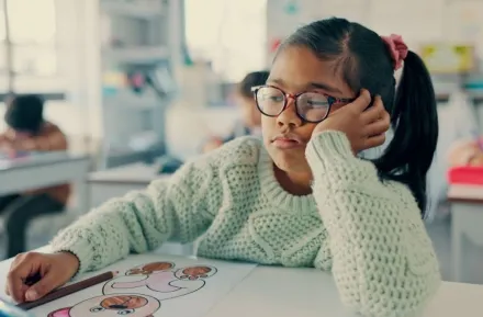 girl child tired and bored at school