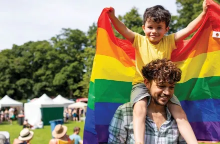 little boy at pride festival