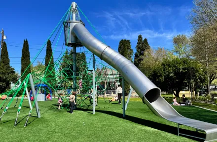 kids playing on the climbing structure at South Park's new playground in Seattle