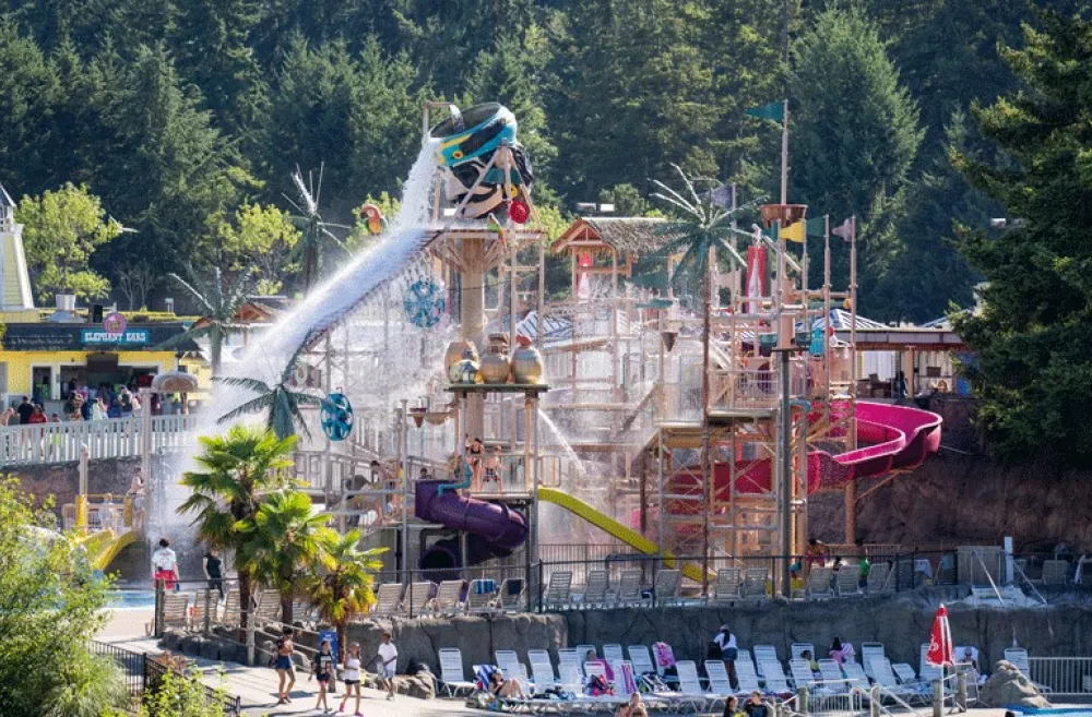 Hook's Lagoon water slides and spray features on a sunny day at Wild Waves Theme & Water Park near Seattle
