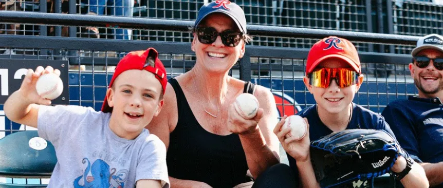 family at a tacoma rainiers game