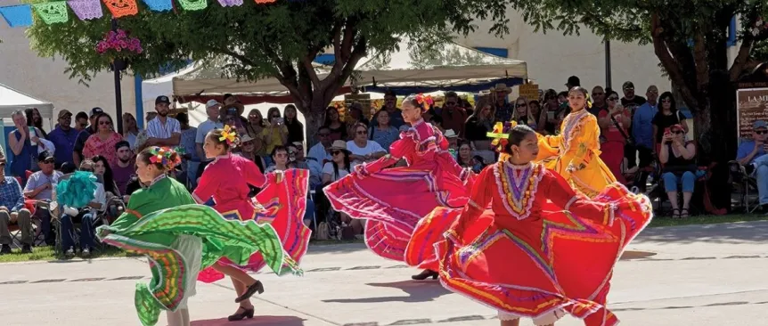 girls perform traditional dance in town square at festival