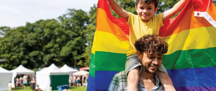 little boy at pride festival