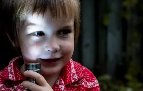 Boy-with-flashlight-fun-games-for-kids-to-play-in-the-dark