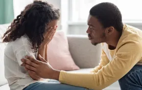 Dad comforting his anxious daughter 