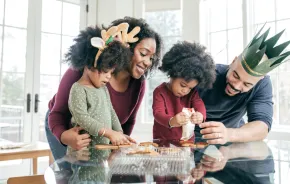 family making holiday treats together