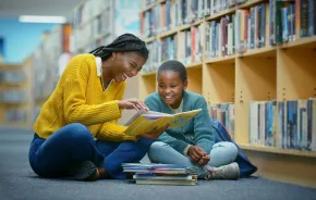 mom and child having fun at a local library