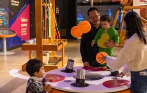 family having fun at Pacific Science Center