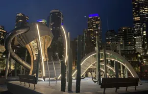 the Pier 58 Playground in Seattle lit at night