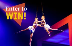 "Enter to Win" text over acrobatic performers