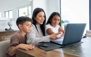 family setting up digital privacy on their home computer