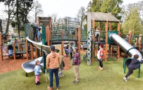 wright park playground reopening celebration with families playing