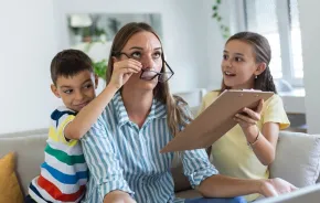 frustrated mum tired of difficult children trying to work from home