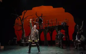 Robin Hood catches an arrow onstage during Seattle Children's Theatre's newest production