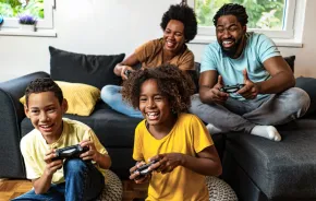 family playing video games together