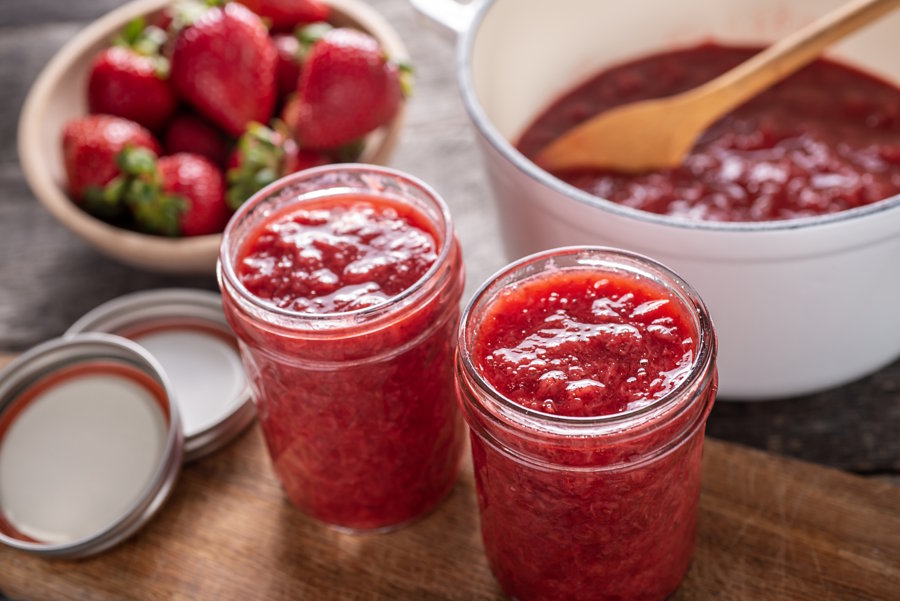 homemade strawberry jam in glass jars